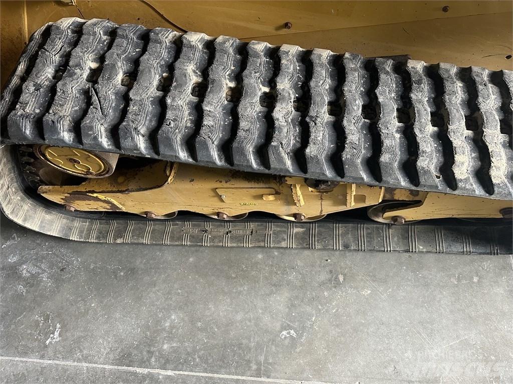 CAT 259D3 Mini Pale Gommate