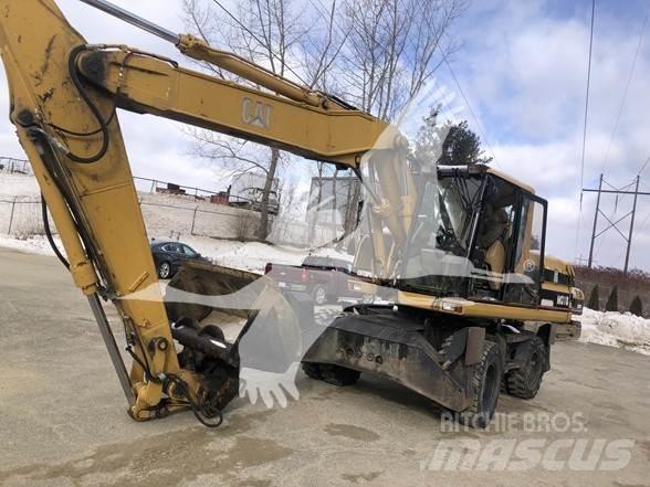 CAT M318 Escavatori gommati