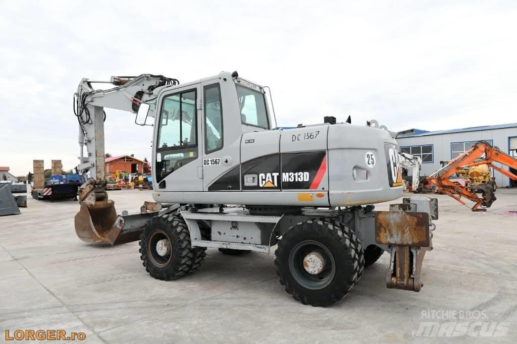 CAT M 313 D Escavatori gommati