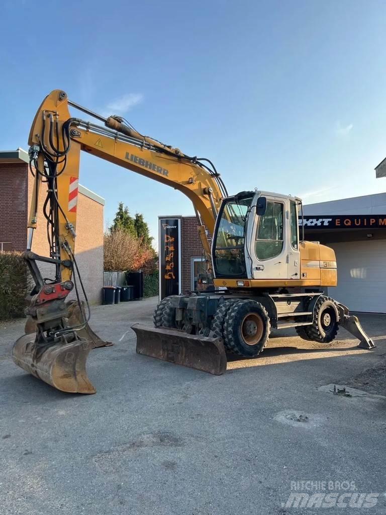 Liebherr A314 Escavatori gommati