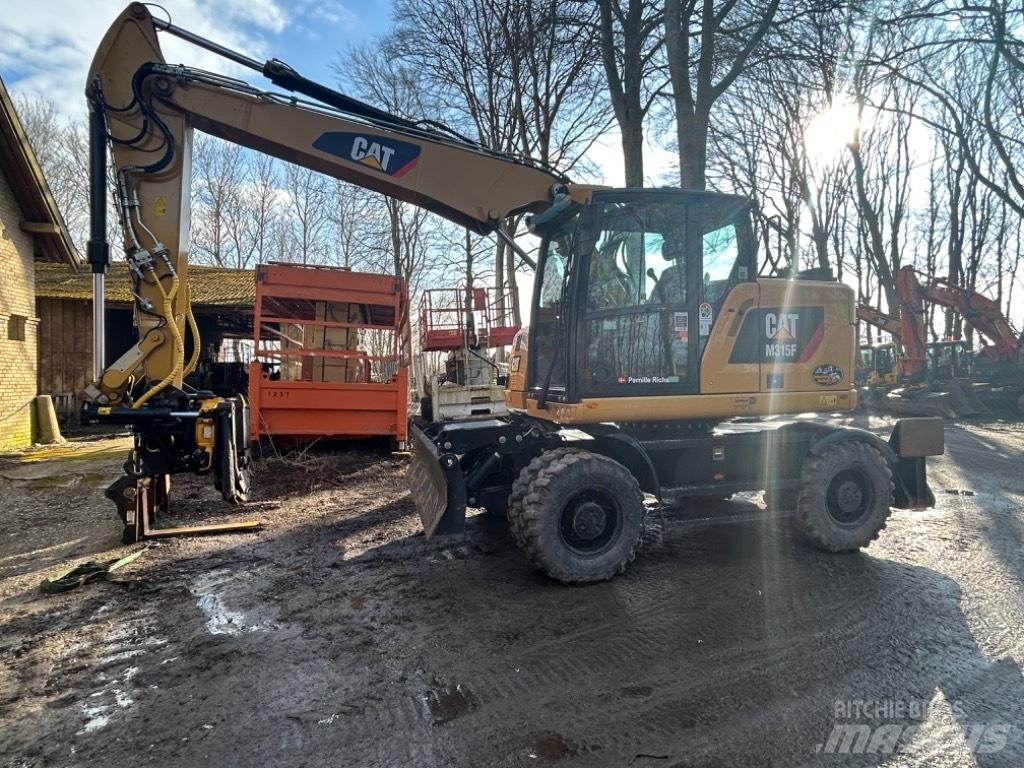 CAT M315 Escavatori gommati