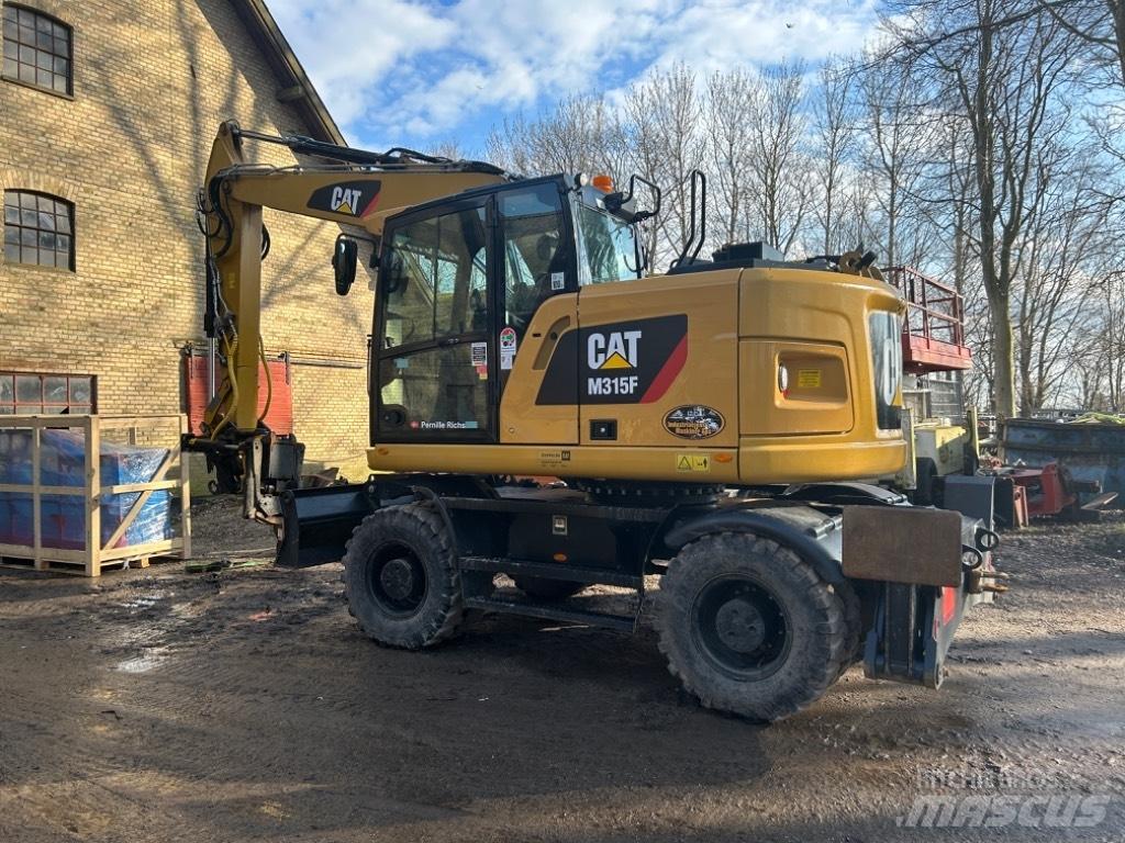 CAT M315 Escavatori gommati