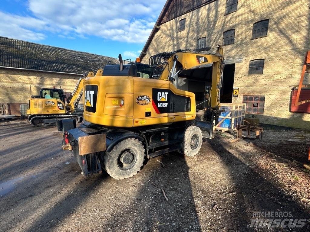 CAT M315 Escavatori gommati