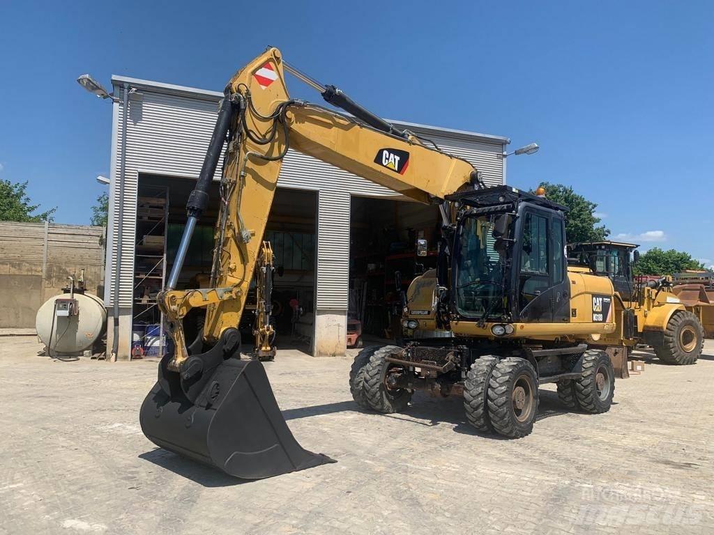 CAT M 318 D Escavatori gommati