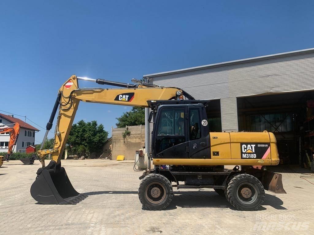 CAT M 318 D Escavatori gommati