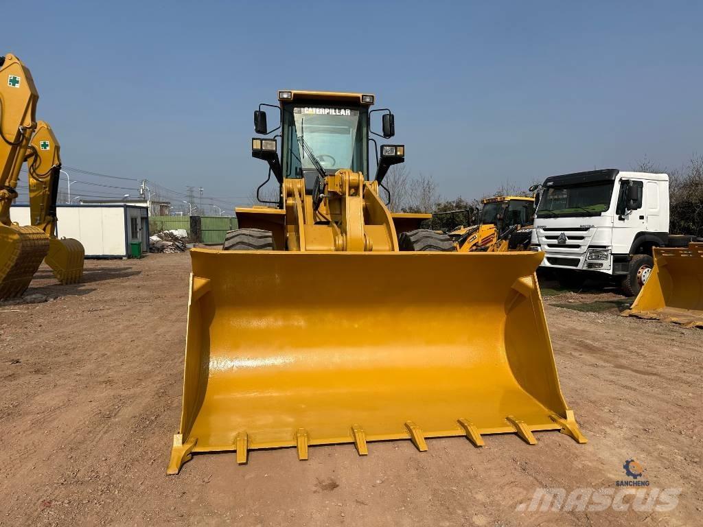 CAT 950G Pale gommate