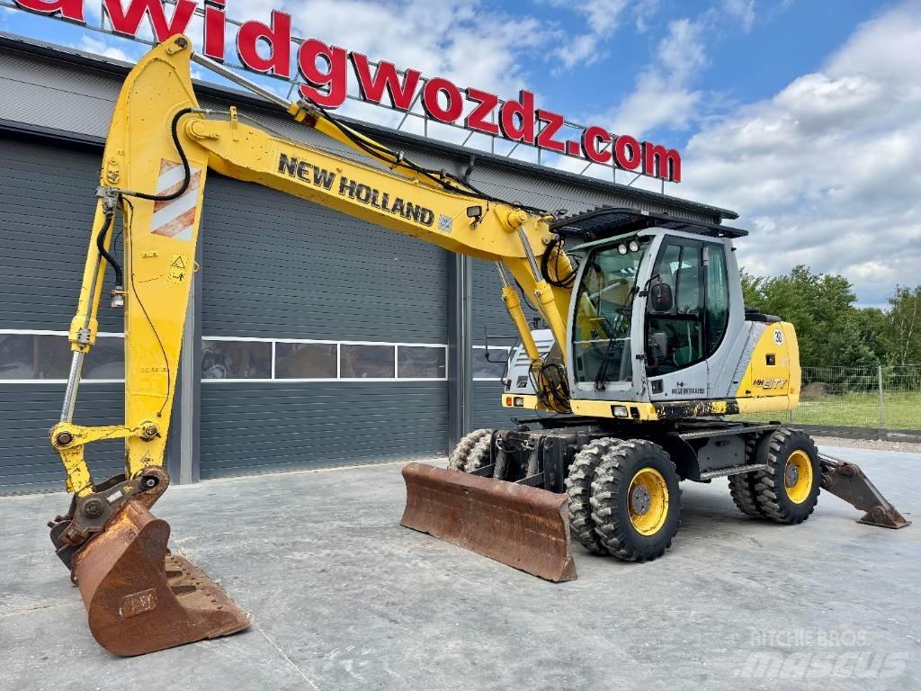 New Holland MH City Escavatori gommati