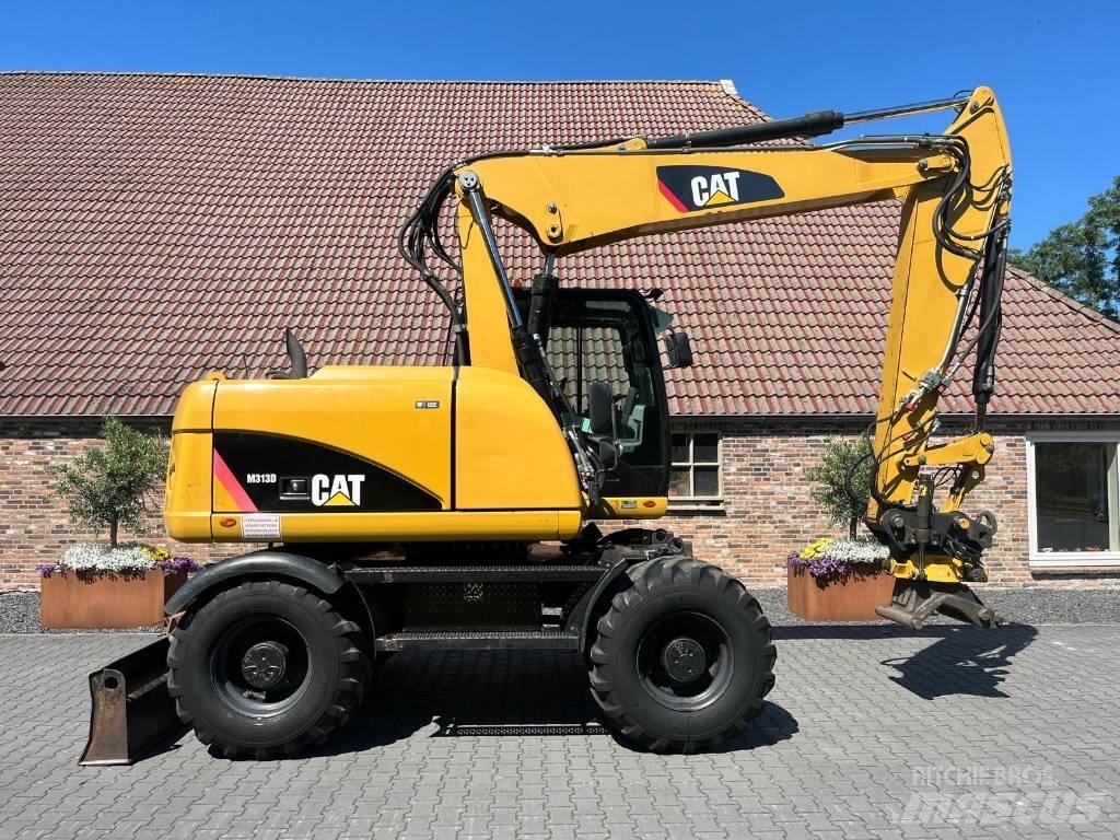 CAT M 313 D Escavatori gommati