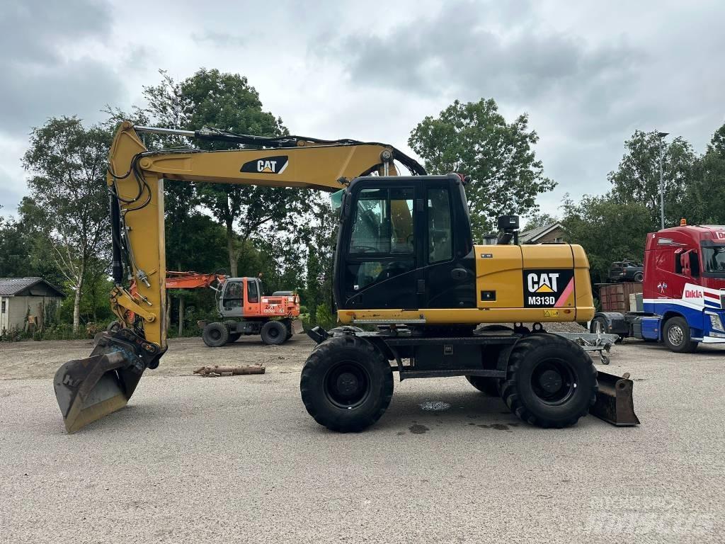 CAT M 313 D Escavatori gommati