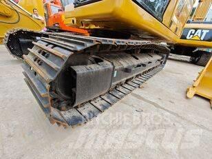CAT 323 Escavatori cingolati