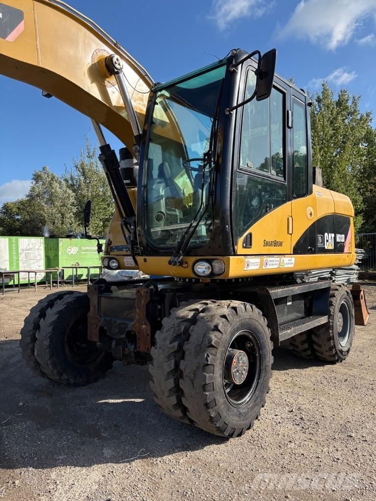 CAT M 313 D Mono Escavatori gommati