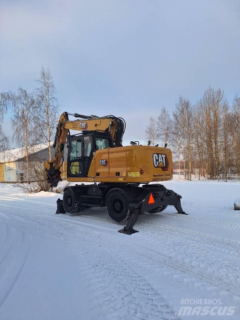 CAT M 318 Escavatori gommati
