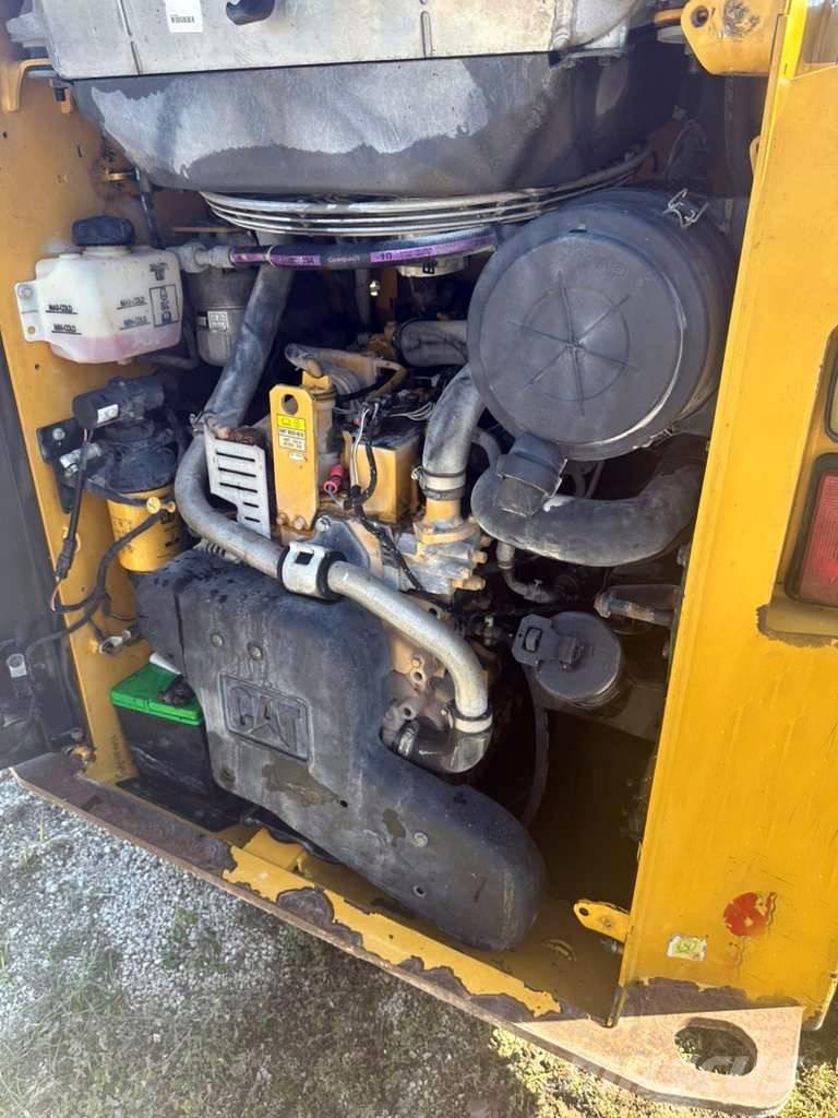 CAT 259 D Mini Pale Gommate