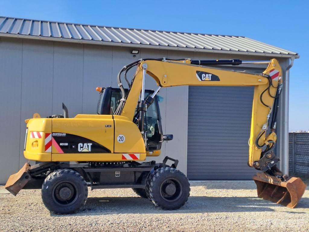 CAT M 313D Escavatori gommati