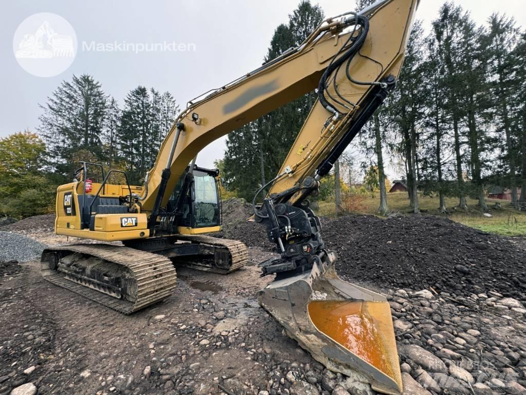 CAT 323 Escavatori cingolati
