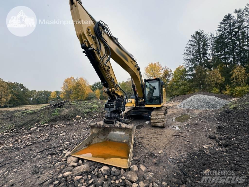 CAT 323 Escavatori cingolati
