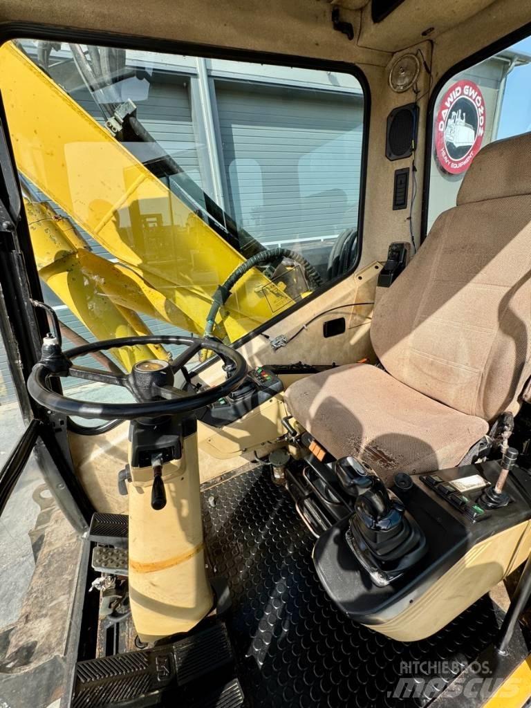 CAT M 312 Escavatori gommati