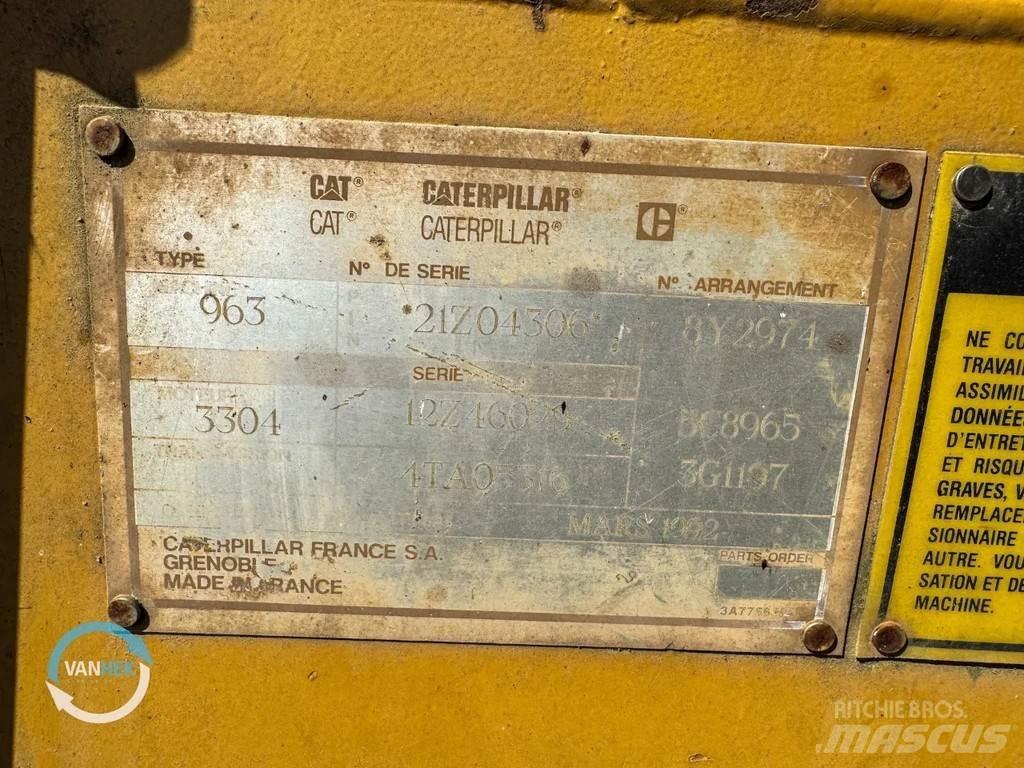 CAT 963 Pale cingolate