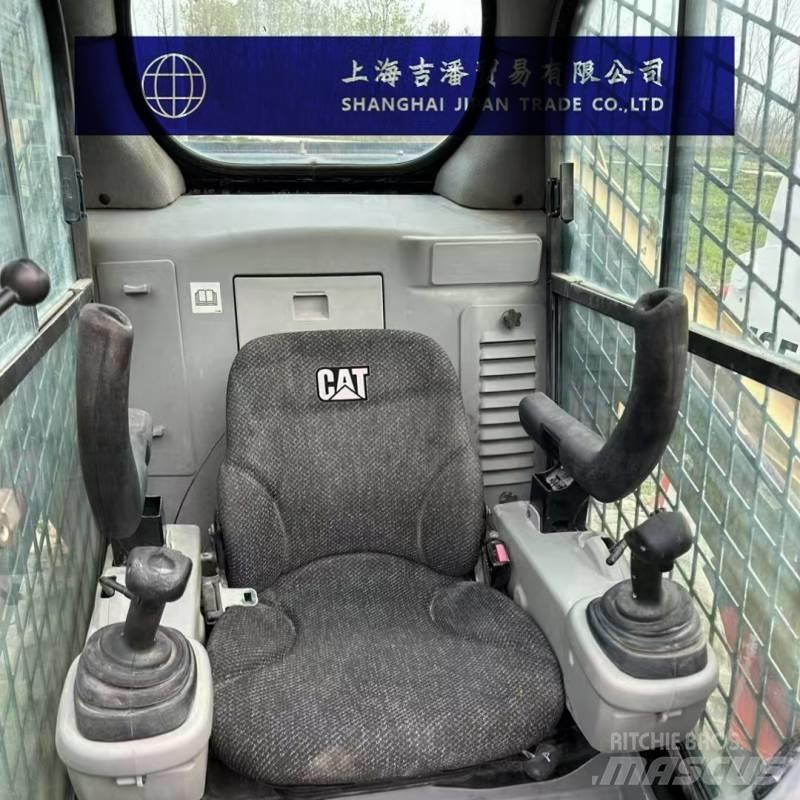 CAT 246 C Mini Pale Gommate