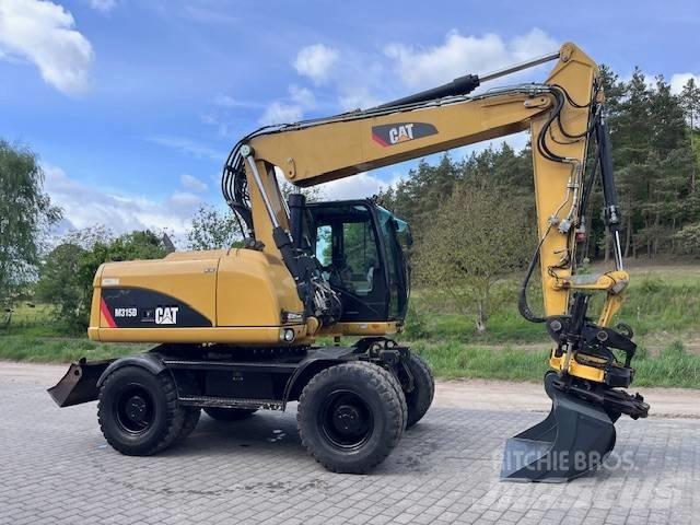 CAT M 315 D Escavatori gommati