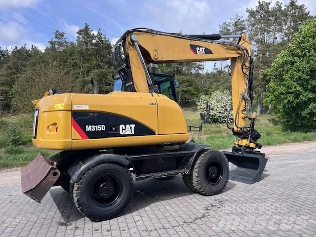 CAT M 315 D Escavatori gommati