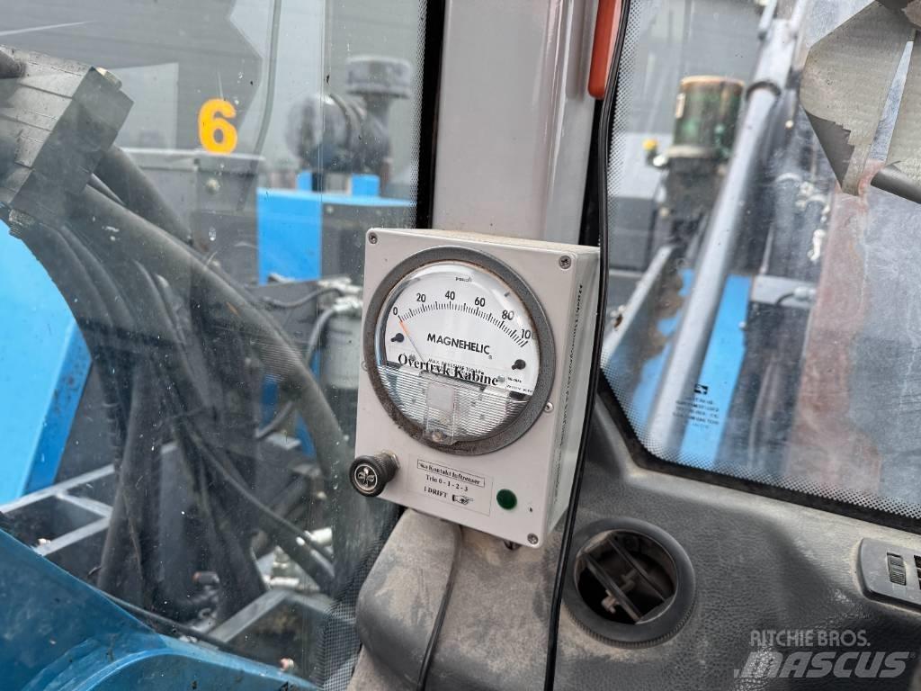 Fuchs MHL 320 Movimentazione rifiuti