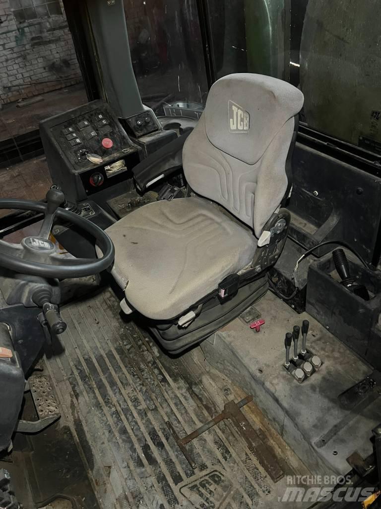 JCB 714 Spandiliquami
