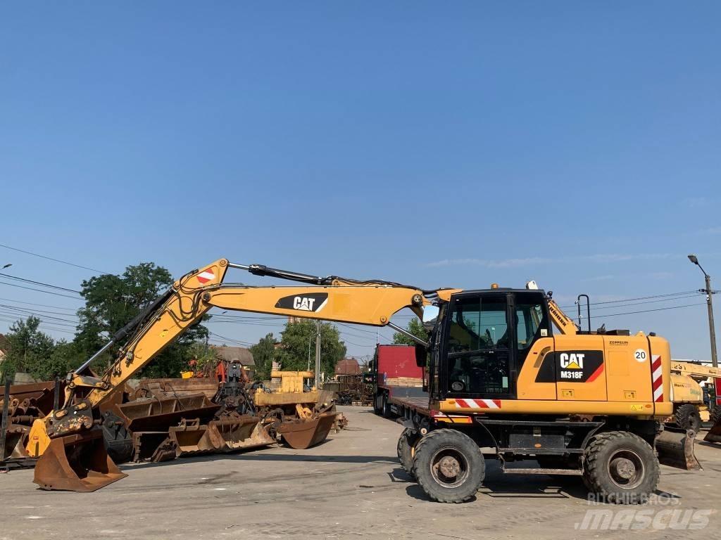 CAT M 318 F Escavatori gommati