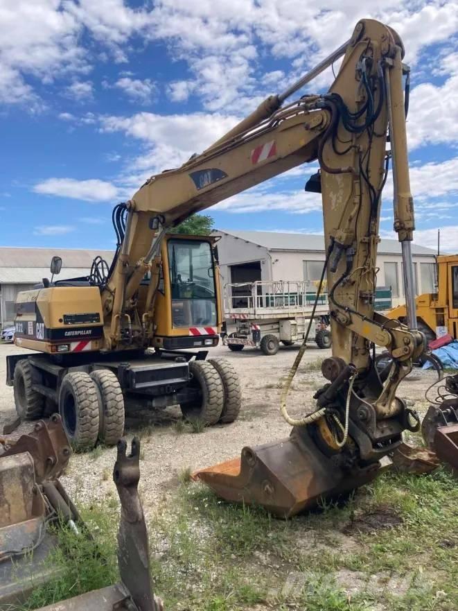CAT M 312 Escavatori gommati