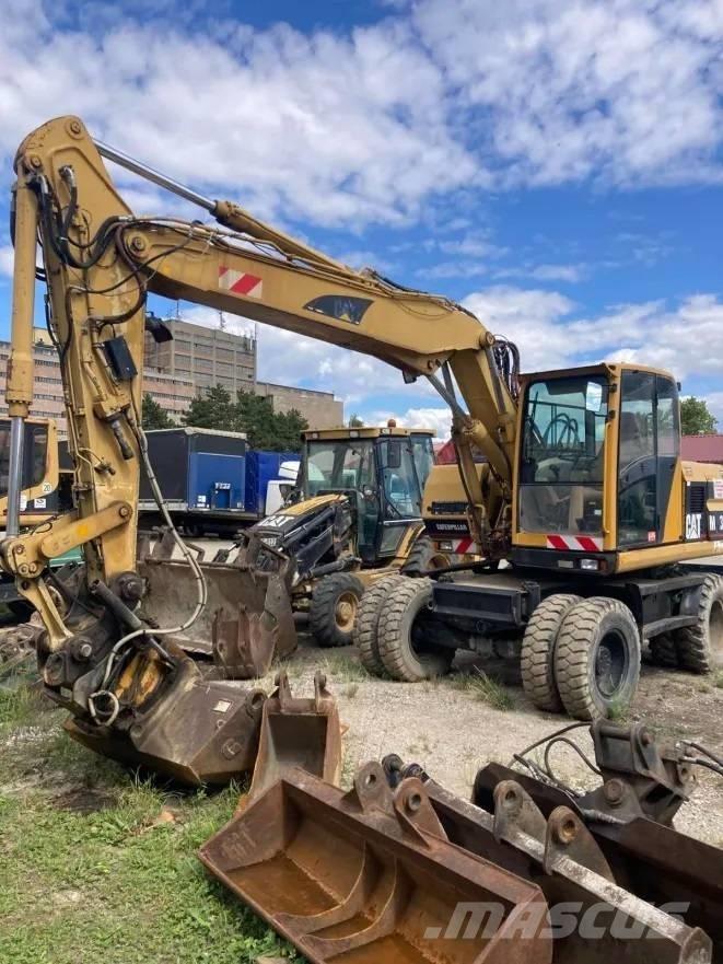 CAT M 312 Escavatori gommati