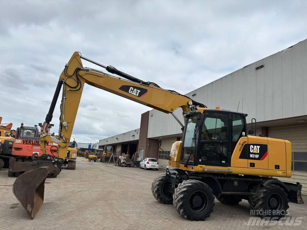 CAT M 318 F Escavatori gommati