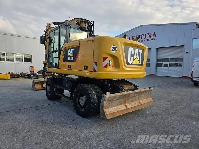 CAT M 318 F Escavatori gommati