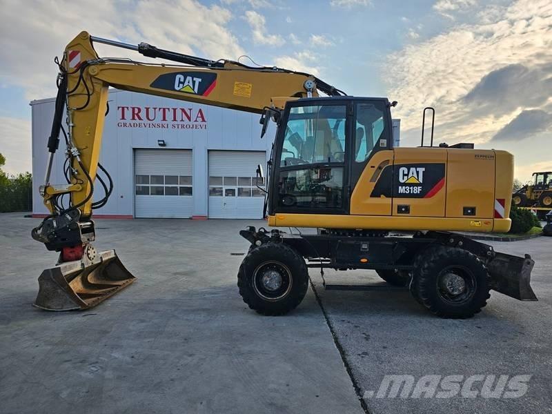 CAT M 318 F Escavatori gommati