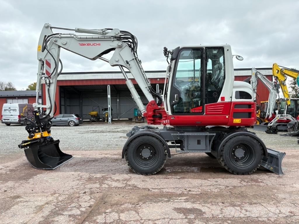 Takeuchi TB395W Escavatori gommati