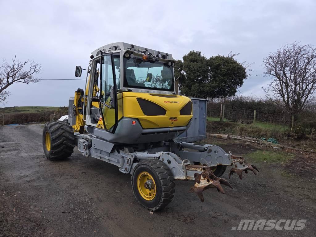Menzi Muck M325 Escavatori speciali