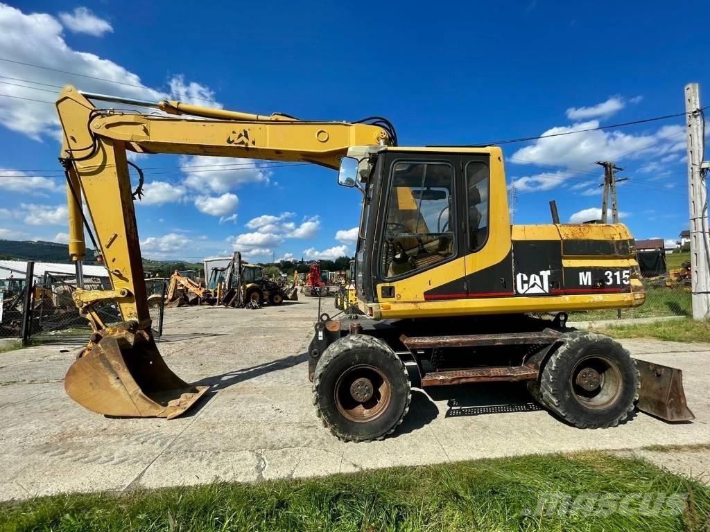 CAT M 315 Escavatori gommati