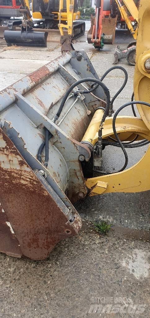 CAT 906M Pale gommate