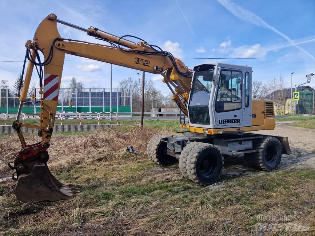 Liebherr 312 A Escavatori gommati