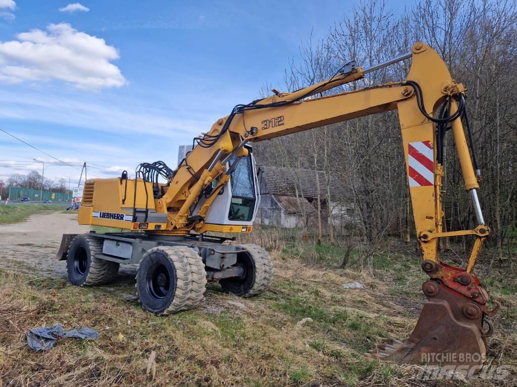 Liebherr 312 A Escavatori gommati