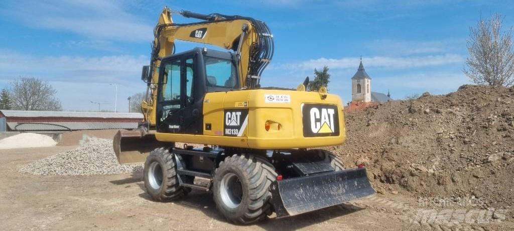 CAT M 313 D Escavatori gommati