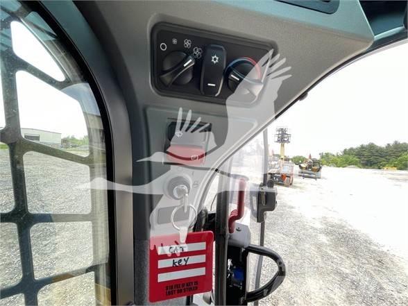 CAT 289D3 Mini Pale Gommate