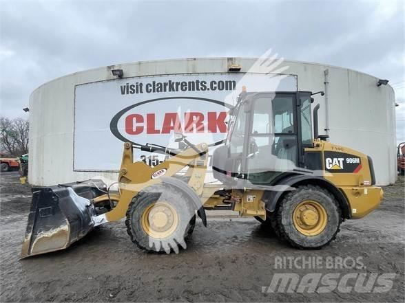 CAT 906M Pale gommate