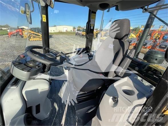 CAT 906M Pale gommate