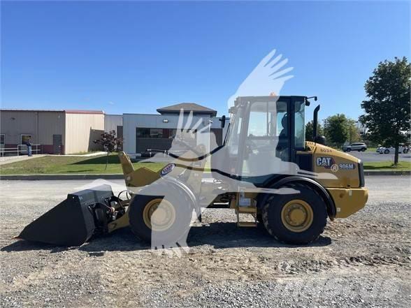 CAT 906M Pale gommate