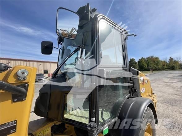 CAT 906M Pale gommate