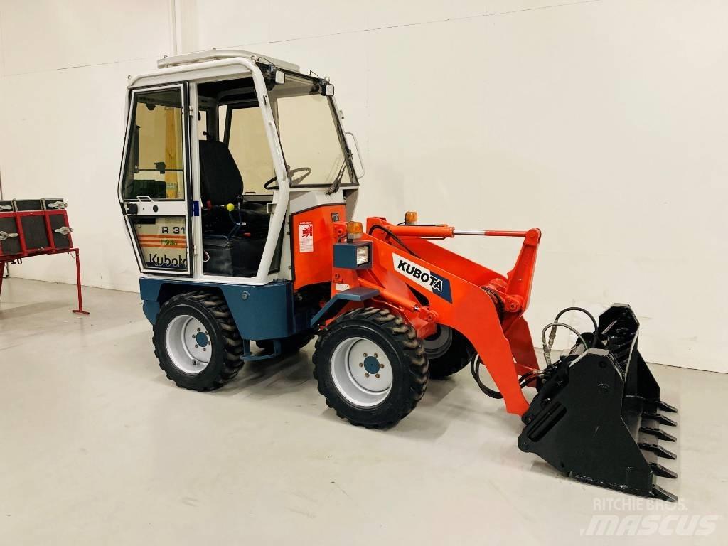 Kubota R 310 Pale gommate