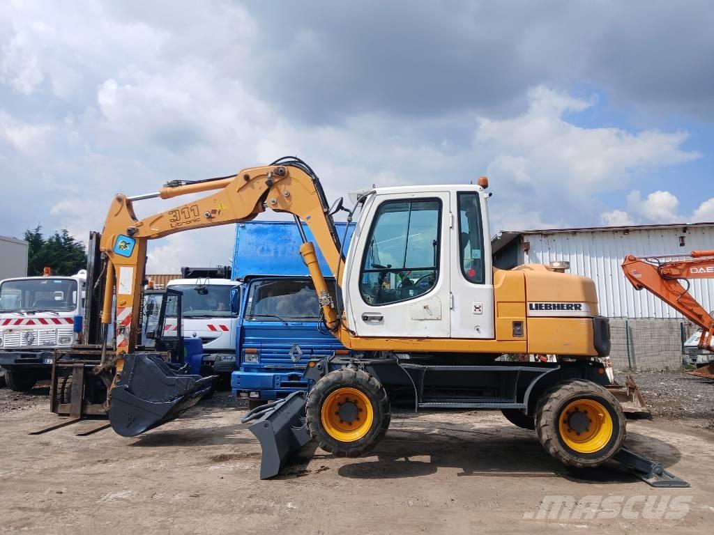 Liebherr A 311 Escavatori gommati