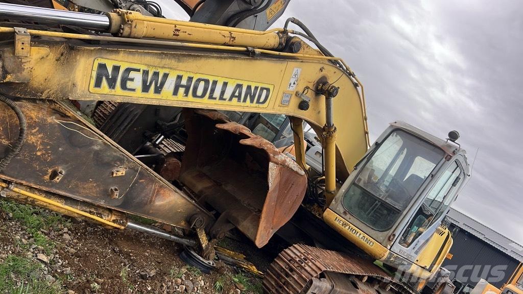 New Holland E 215 B Assi