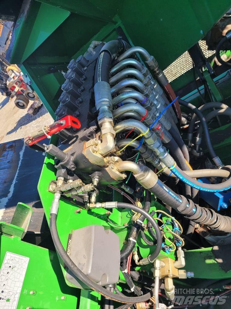 John Deere 853 Abbattitrici cingolate e macchine forestali