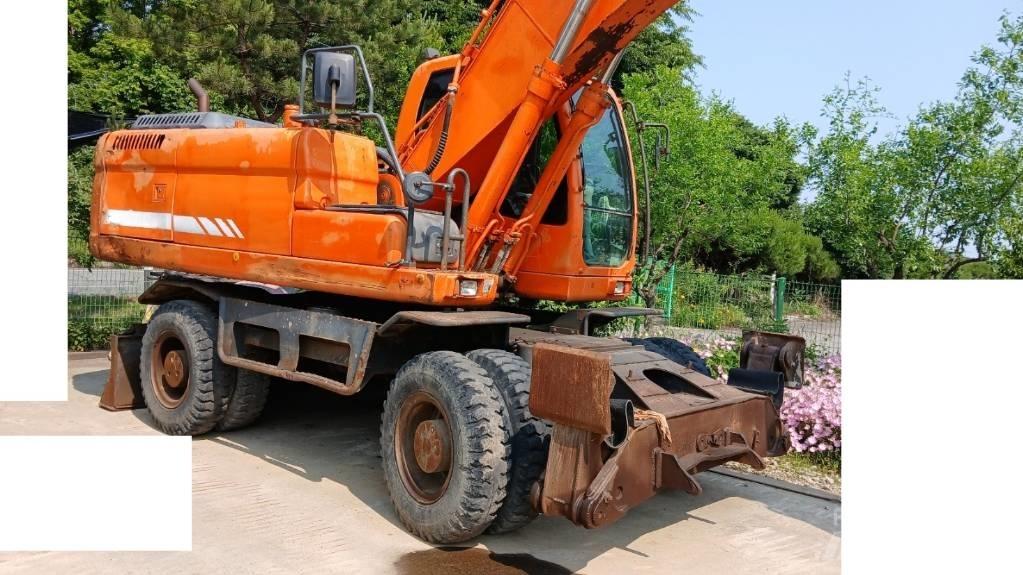 Doosan DX 210 W Escavatori gommati